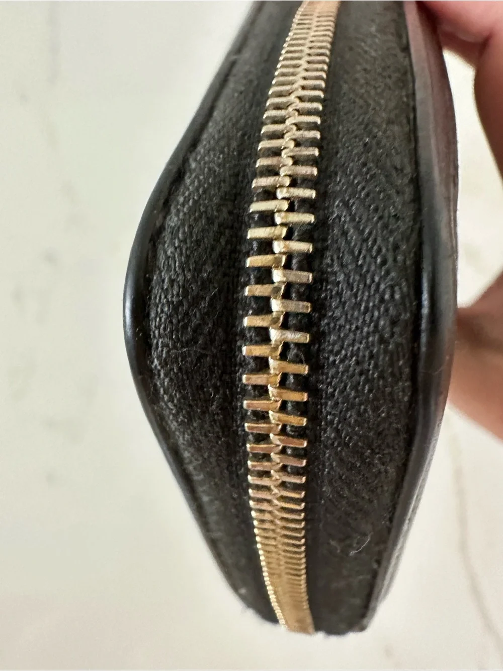 CHANEL Black Quilted Caviar Leather Zip Wallet with Gold Accents